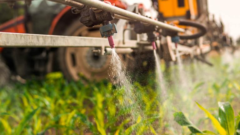 11.-crop_sprayer_spraying_pesticides_on_crops_in_field_1.jpg